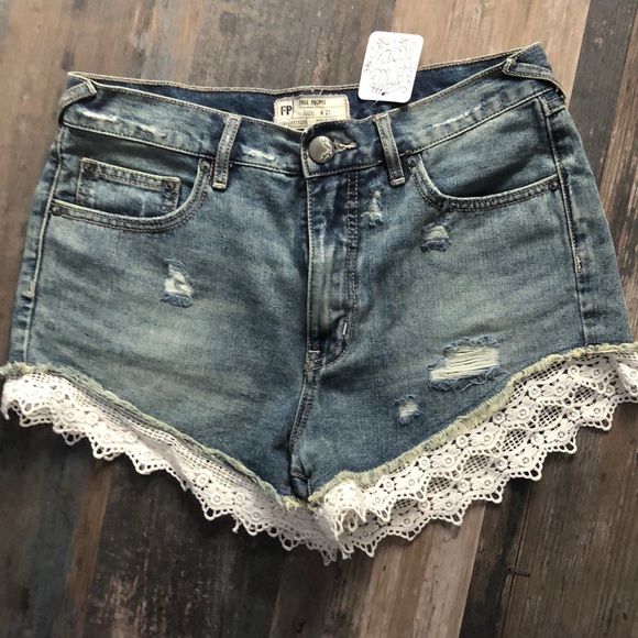 NWT Free People denim shorts with lace trim